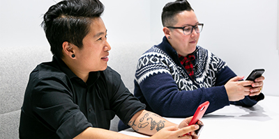 two men talking at table